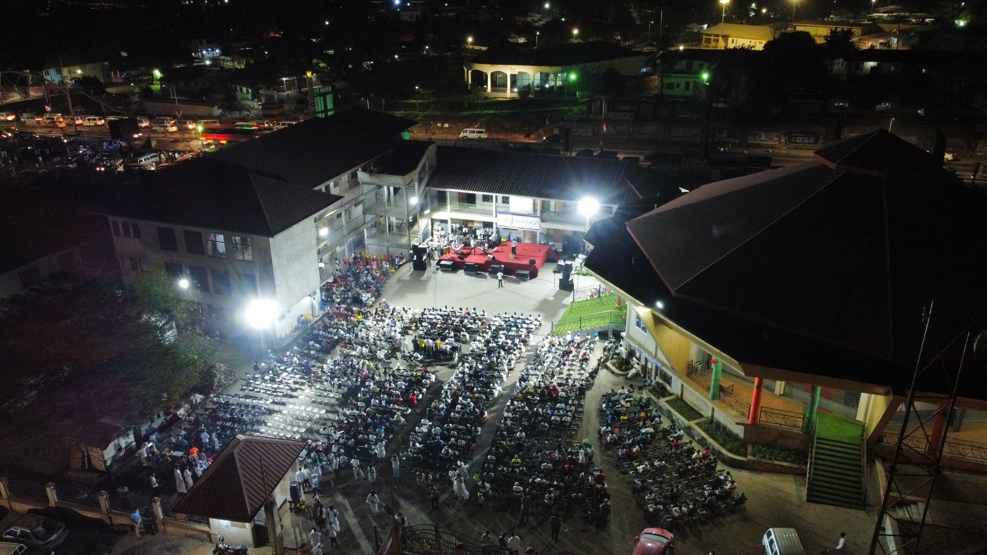 Aerial view of an outdoor evening crusade service